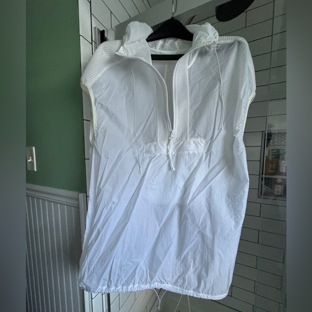 Lightweight sleeveless rain jacket, like new